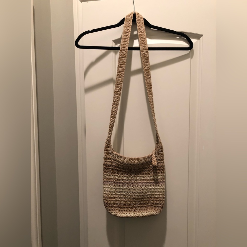 Gently used cross body bag.